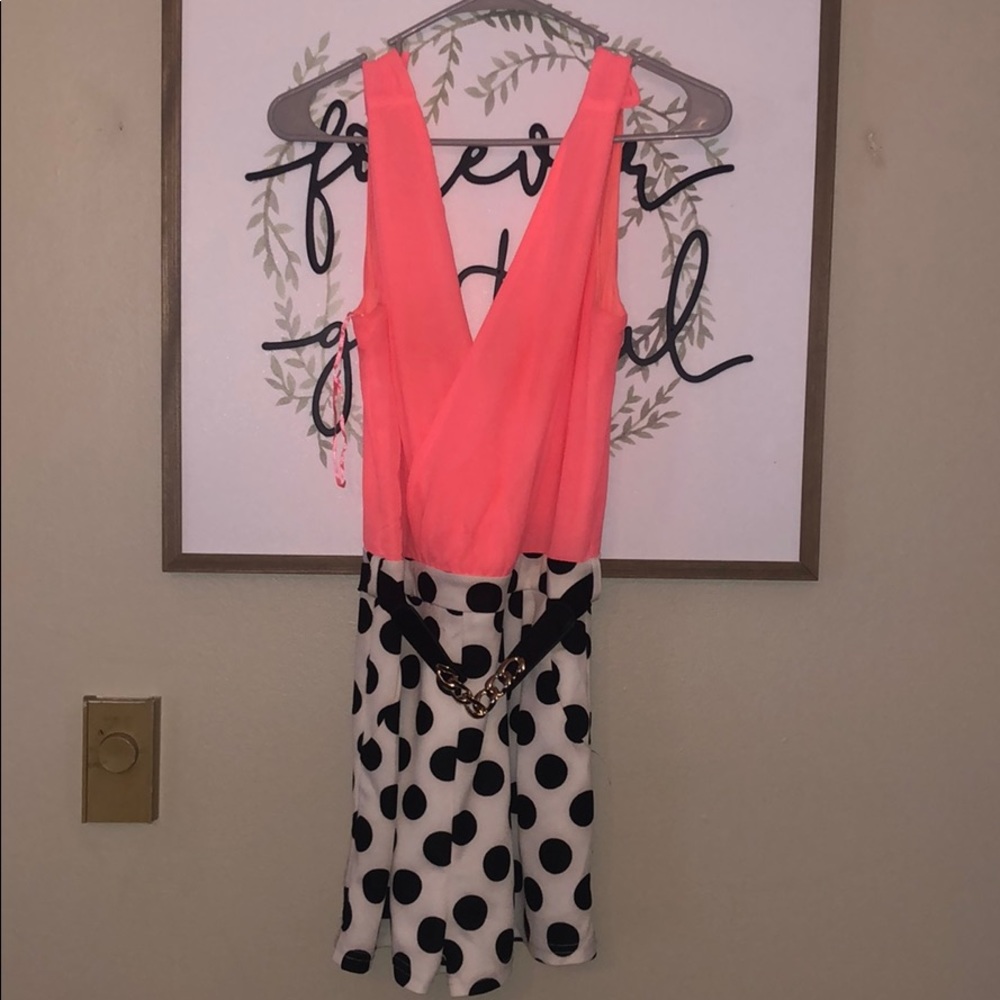 Coral and black and white polka dotted romper